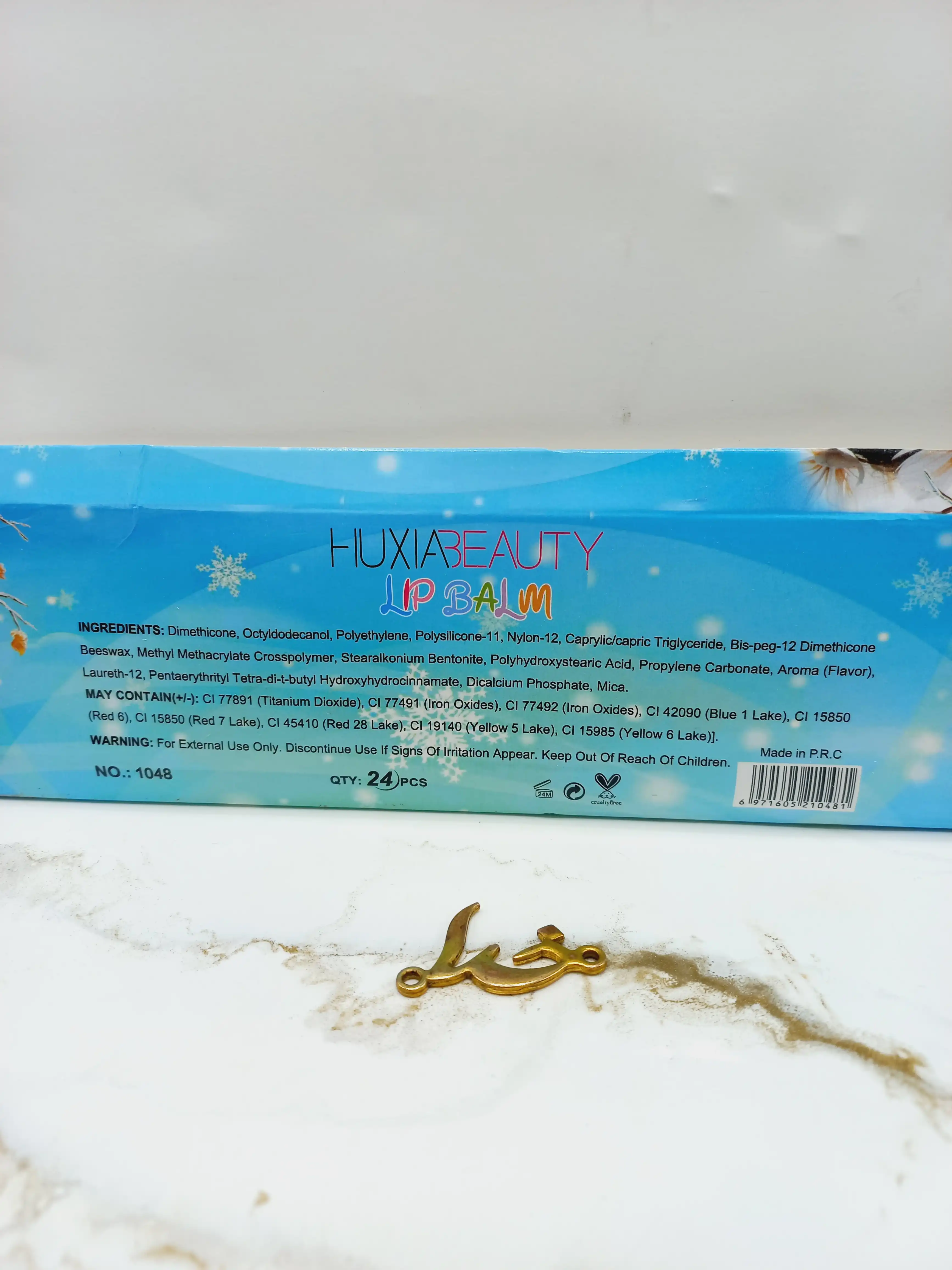 بالم لب طرح دلفین برند هوکسیا بیوتی HUXIA BEAUTY کد 1048
