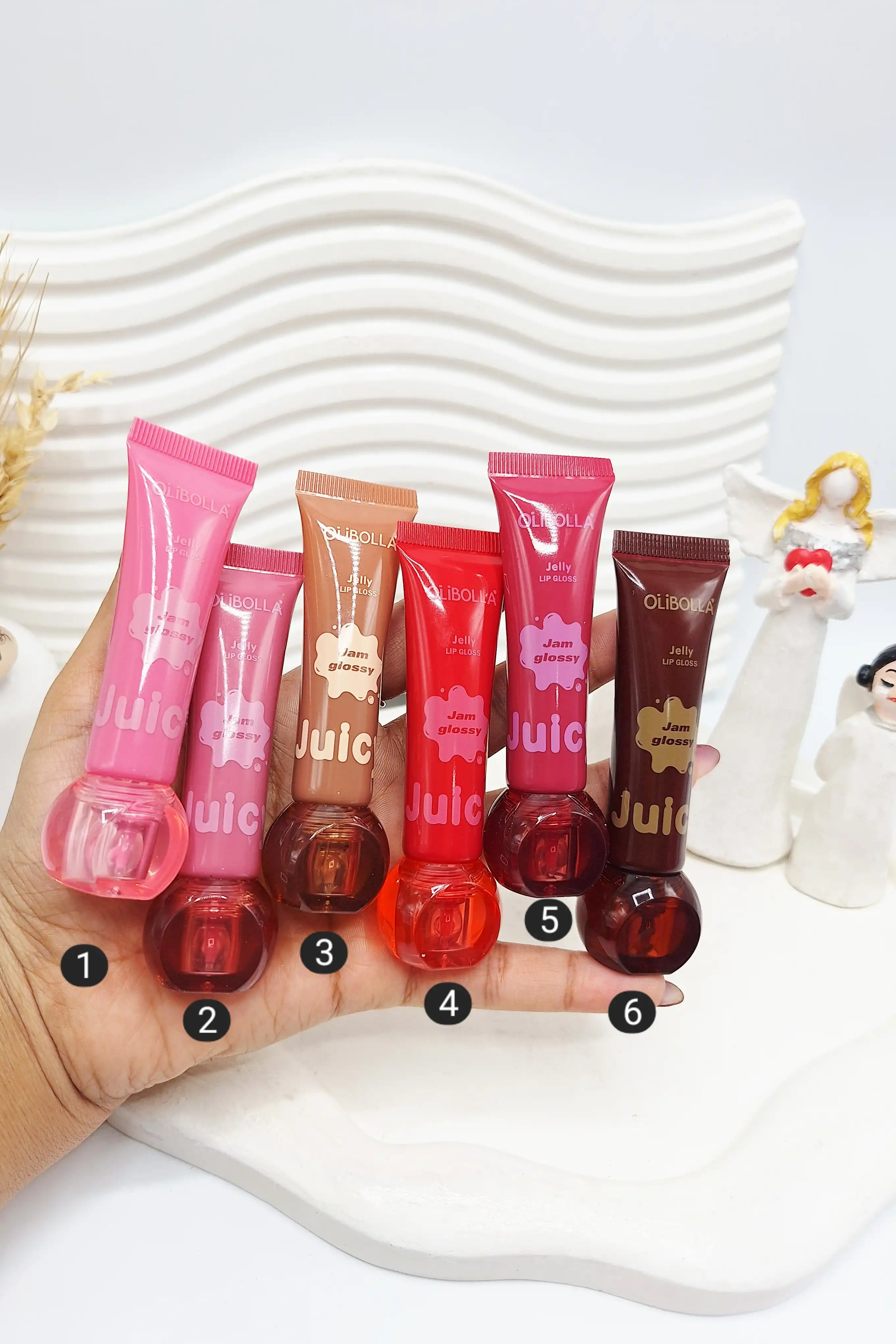 حجم دهنده و براق کننده لب ژله ای برند اولی بولا کد 300